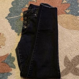 Black skinny high rise button fly crop jegging